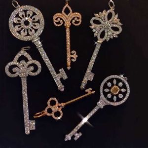 Merk Key Necklace van de ontwerper 925 Sterling Silver Sunflower Sneeuwvlok Key ketting Yingwei Bloem Hart Kroon Luan Tail Flower Pendant
