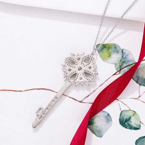 Merk Key Kief ketting van designer Gold Patating Volledige diamant sneeuwvlok hanger Simple en luxe stijl trui keten dames hoge kwaliteit 90 mg