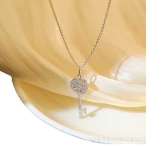 Designer's Gold Plating High Edition Brand Key Necklace Dames Nieuwe volledige diamant zonnebloem hanger kleine sneeuwvlok iris kraagketen FV35