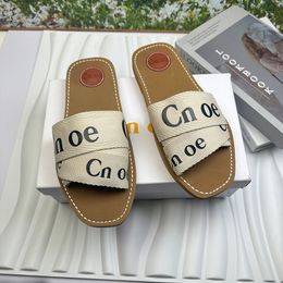 Sandales de créateur Luxury Femme Woody Clogs Mule Flat Sandales Sandals Letter Locage Pantoufles Slippers Pinks Summer Place Plateforme Herringbone Chaussure Herringbone