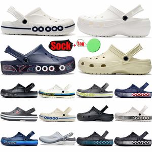 Sandalias de diseñador Tubos de goma Sandalia para hombres Mujeres Plataforma clásica Plataforma Suelas de la suela agujeros Sandale Sandale Summer Slides Beach Beach