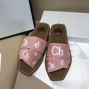 Sandales de créateur pantoufles diapositives chaussures de plage pour femmes pantoufles en cuir larges bretelles croisées