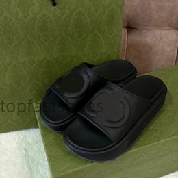 Sandalias de diseñador Zapatillas de plataforma de suela gruesa Zapatos de verano para mujer Flora Slides Plantilla moldeada Suela de goma ajustable negra con logo en relieve en el exterior