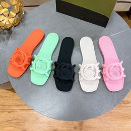 Sandalias de diseñador Mujeres entrelazadas G Slidas Slip de goma Interlockización de zapatillas huecas zapatillas de verano G Lets Flats Piscina de playa Fuera impermeable al aire libre