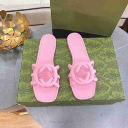 Sandalias de diseñador Mujeres entrelazadas de toboganes G zapatillas de goma de goma Damas de la playa plana Script Orange Summer Fall Mules de lujo impermeable al aire libre 10086