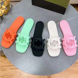 Designer sandalen vrouwen in elkaar grijpen g glijbanen rubber slippers dames plat strand jelly script oranje zomer herfst muilezels buiten waterdichte platte slippers og