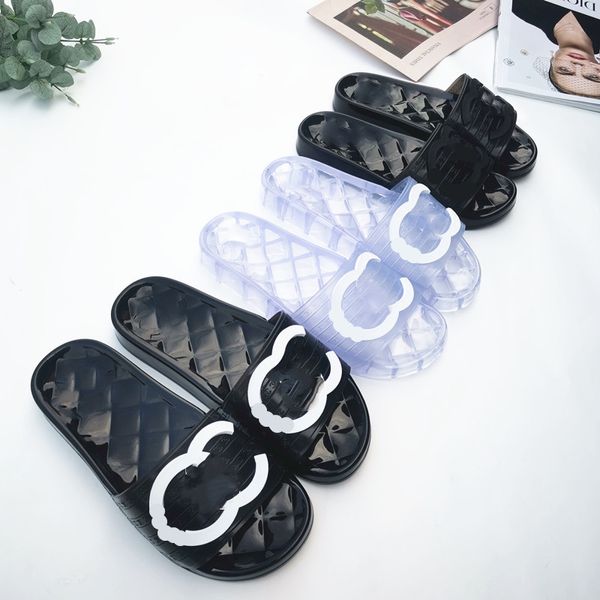 sandalias de diseñador sandalias para mujer Sandalias de jalea de PVC transparente Letra para mujer Impreso Zapatilla de verano de lujo Diapositivas Chanclas de silicona para dama Tamaño de zapato plano 35-42