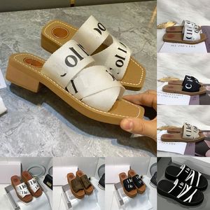 Sandales de créateur Pantoufles en bois Mules sandale boisées pour femmes toile toile tissu talons plats hauts glissa