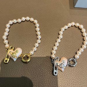 Ontwerper Seiko Brand Love Pins Pearl armbanden Gold Silver Peach Heart Oorringen Kleine populaire mode H -ornamenten