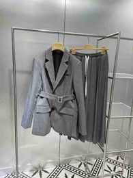 ontwerper Shenzhen Nanyou high-end Miu thuis vroege lente woon-werkverkeer modieus eenvoudig waardig senior grijs pak rok pak VIMJ