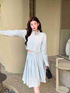 Designer Shenzhen Nanyou High end MIU Thuis Vroege Herfst Dagelijks Casual Veelzijdige Lichte Kleur Gewassen Shirt Geplooide Rok Set D3M1