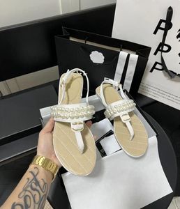 Designer schoenen nieuwe flats sandaal dames schoenen kanaal 2024 zomer strandclip teen glijbanen luxe merk flip-flops gewatteerde ketting sandalen hiel dames slippers logo tn 2757