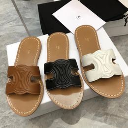 Zapatos de diseñador Zapatillas de mujer Sandalias de playa de verano Ocio al aire libre Zapatillas de espiga de cuero de lujo Zapatillas de tacón plano Piscinas de hotel Paseos al aire libre