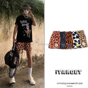 Diseñador de moda corta Ropa casual Ip Americano debajo de la rodilla Pantalones cortos Marca de moda Estampado de leopardo Malla suelta Transpirable Baloncesto informal Cuartos de correr Verano