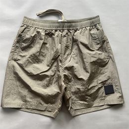 Shorts de diseñador bordado de lujo para hombre shorts de nylon de metal pantalones cortos de piedra calles de secado rápido