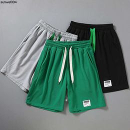 Shorts de créateurs Nouvelles explosions grands shorts pour hommes été nouveau mince et gros taille plus lâche extérieur portant un pantalon de plage moyen pour hommes