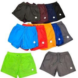 Shorts de concepteur Swim Short Swimshort imperméable Hommes Femmes Luxe Hommes Court Sports Yoga Pantalon Summer Beach Natation Lâche Cordon Tendance Maillots de bain respirants