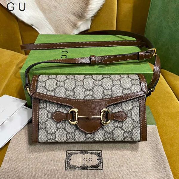 Bolso de hombro de diseñador Envío gratis Cuero original Nueva familia Kuqi Hebilla de caballo Seri Mini bolso de un solo hombro Caja Msenger para niños