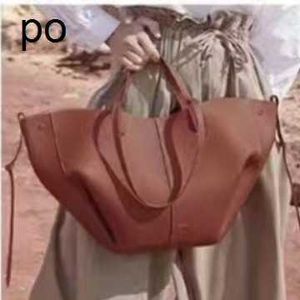 Sac à bandoulière design livraison gratuite sac à ailes P sac de déformation petite marque de niche française sac en cuir véritable pour femme