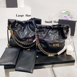 Designer schoudertassen Letter emmer tas Echt leer Handtas met trekkoord Gouden of zilveren ketting Tote tassen voor dames Mode portemonnee Luxe tas Merken Reizen