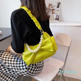 Diseñador - Bolsos de hombro Bolso de cuero suave con cadena de perlas Crossbody para mujer Bolso de mensajero con lazo de moda Sac Vintage Street Shopping 2022