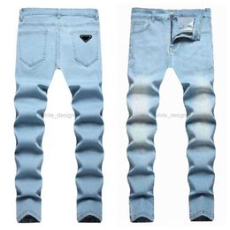 Designer Skinny Fashion Men Jeans pour hommes Pantalons pour femmes Marque Black Grey Jeans Hole New Style Empose d'auto-culture Small Feet