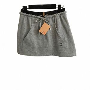 jupe de créateur femmes jupes plissées marque courte jupe hanche logo fi femme d'été vacati mini-jupes irrégulières vêtements de voyage pour femmes mars 07 S7fC #