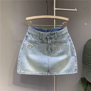 Jupes de créateurs jupe en jean pour femmes lettre de personnage broderie zipper bouche bleu clair jupe en ligne A-line