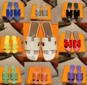Diseñador Slide Oran Señoras Escalera Chypre Moda Sandalias de cuero simples Zapatillas planas de playa al aire libre