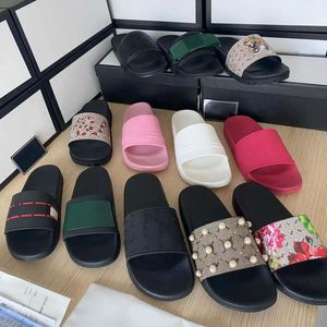 Designer Slides Femmes Homme Pantoufles Sandales de luxe Sandales de marque Sandales en cuir véritable Flip Flop Flats Slide Chaussures Casual Baskets Bottes 2023 Nouveau