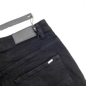 Designer Slim Leg Pant imprimé jeans pour hommes Hip Hop Black Pantal Trou Fashion Skinny Club Club régulier 292Z