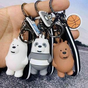 Designer Sneaker Cuir Porte-clés en silicone Notre poupée nue Cartoon Sac pour hommes et femmes Cartable Trois pandas Pendentif tridimensionnel Grand ours polaire blanc