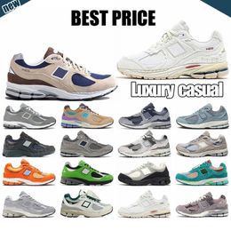 Designer Sneakers 2002r hardloopschoenen atletische damesheren casual jogging sneaker op regen wolk roze grijs bruine suede zomer