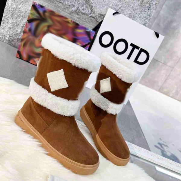 Diseñador Botas de nieve Boot de tobillo Mujeres de piel de oveja zapatos de cuero de piel de cuero