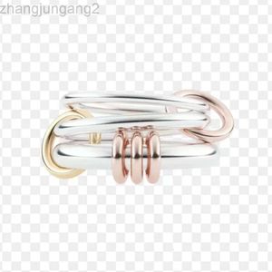 Diseñador Spinelli Rng Conexión de múltiples anillos Empalme de tres colores Tres anillos Acero de titanio galvanizado con oro real de 18 k