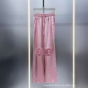 Designer SS24 printemps / été nouveau créneau de créneau de conception du tempérament de serviette en peluche pantalon décontracté polyvalent