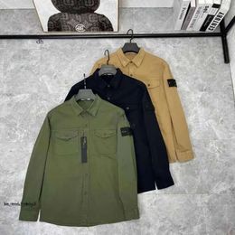 Diseñador de chaquetas de bolsillo de piedra chaqueta isla de manga larga insignias de cremallera hombres camisetas casuales de viento de viento