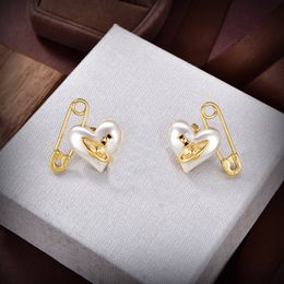 Boucles d'oreilles design Viviane luxe femmes bijoux de mode boucles d'oreilles en or métal perle boucle d'oreille cbijoutier Westwood femme 23