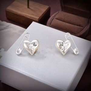 Boucles d'oreilles design Vivianity luxe femmes bijoux de mode boucles d'oreilles en or métal perle boucle d'oreille cbijoutier Westwood femme 812