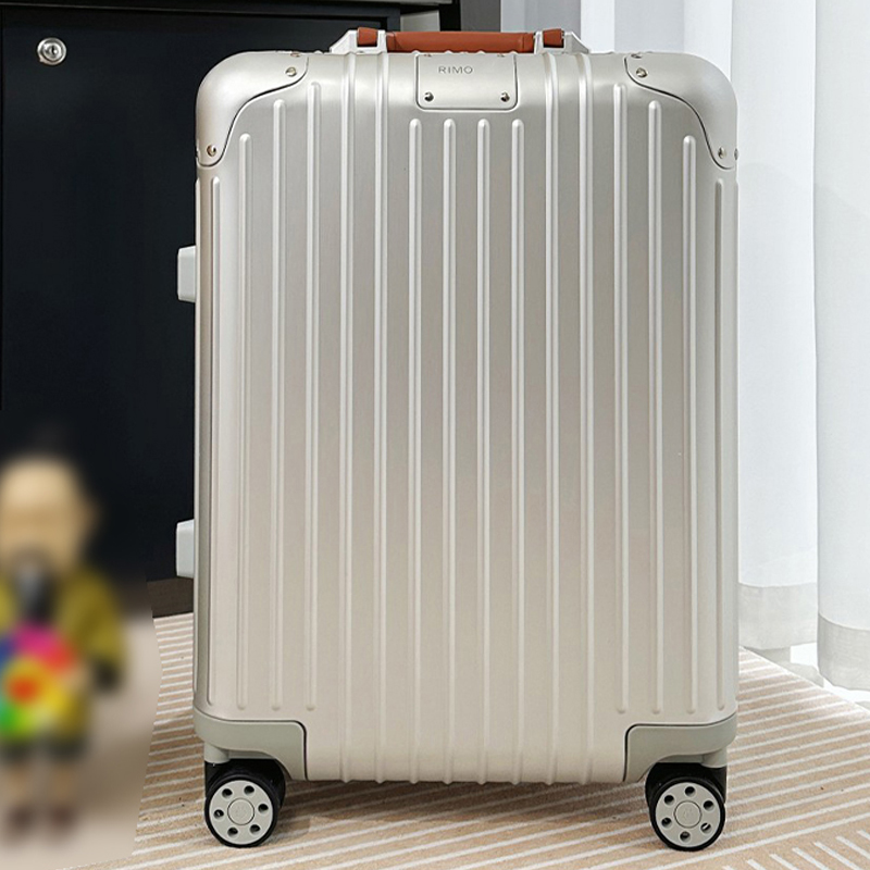 Concepteur Suitcase Aluminium Suitcase Suigage avec roues Boîtes de poignée en cuir Boîtes de passe en alliage Case de voyage Sac de voyage Board