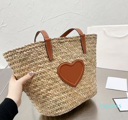 Designer-Summer Beach Straw Bags Casual Rotin Femmes Sacs à main en osier tissé Totes Seaux Messenger épaule sac à provisions Style de vacances