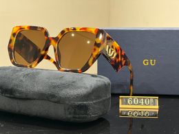 Designer zonnebrillen dames mode GGCCC Brand heren geavanceerde pc -frame luxe zonnebrillen serie 9colors benzine loguat pad optimistische favoritea persona aanwezig