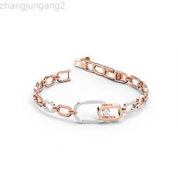 Designer Swarovskis sieraden Shi Jia 1 1 Originele sjabloon kloppende hartring in elkaar grijpende armband vrouwelijke zwaluwelement kristallen armband