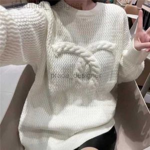 Sweater de diseñador Mujeres Explosión de otoño de la red coreana de lujo rojo con cofre CC Design Sweater Temperamento Todo el estilo sólido de estilo perezoso para usar una parte superior