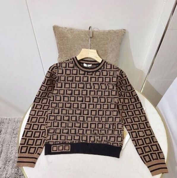 Diseñador Suéter de mujer Cuello redondo Moda a rayas Otoño e invierno Manga larga Mujeres de gama alta Todo Jacquard Cardigan tejer suéteres