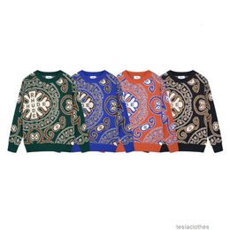 Suéteres de desenhista Moda Casual Vestuário Hoodies American Rhude 2023 Autumnwinter Jacquard Cor Combinando Pescoço Redondo Caju Blossom Sweater Casual Solto Mens Wo