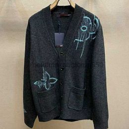 Diseñador suéteres moda hombres casual redondo manga larga bordado suéter hombres mujeres con cuello en v cardigan punto letra impresión suéteres estilo pareja S502