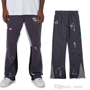 Pantalons de survêtement de créateurs Pantalons de sport en coton Lettre pour hommes Encre peinte à la main Éclaboussures cousues et femmes High Street Cordon Baggy Pantalon