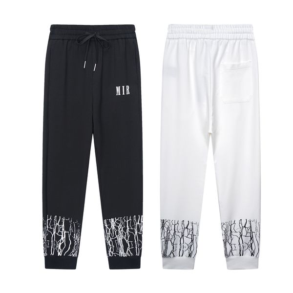 Pantalons de survêtement de créateur Hommes Lettre Logo Pantalon de fissure d'impression de pied Qualité Top Mode Pure Noir Blanc Coton Taille de luxe M-2XL