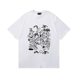 T-shirt de designer Drews Sourire Visage Graffiti Pur Coton Imprimé T-shirt Lâche Sports Peinture À Manches Courtes Pour Hommes Et Femmes Rue Mignon T-shirt De Mode